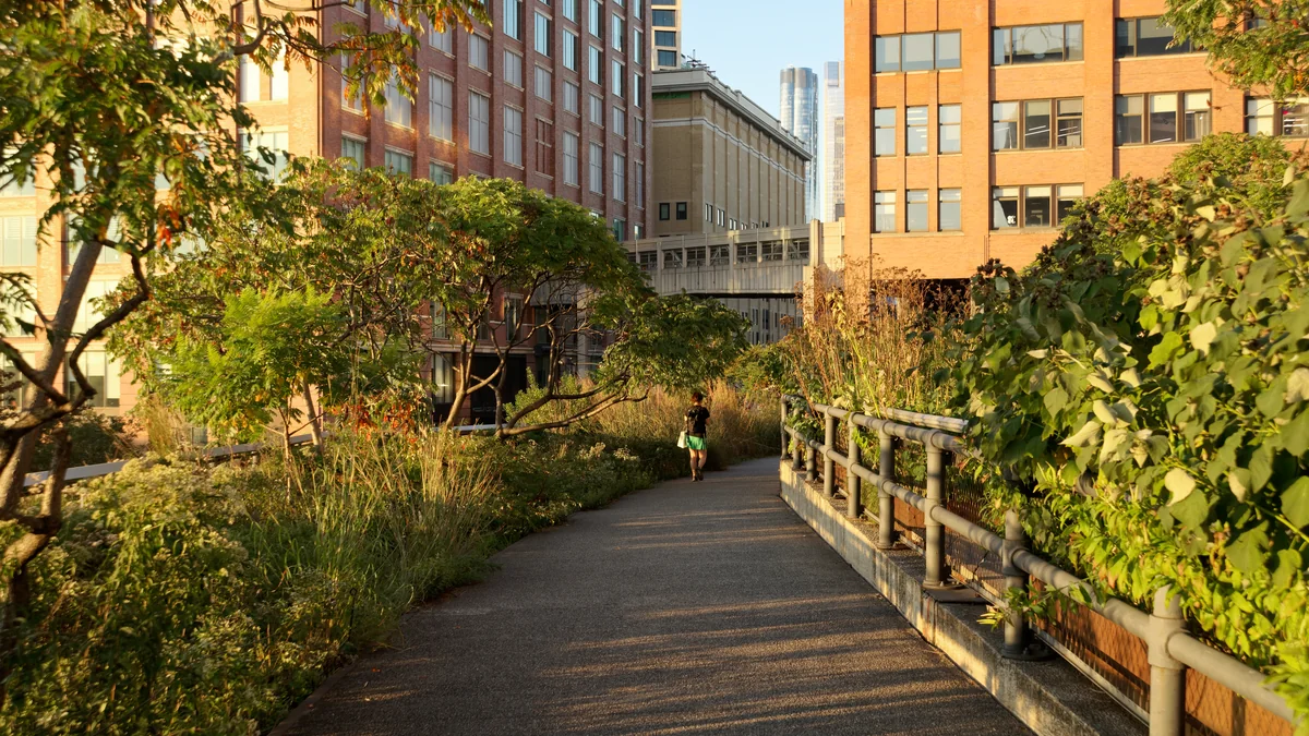 People walking along the High Line in New York City.