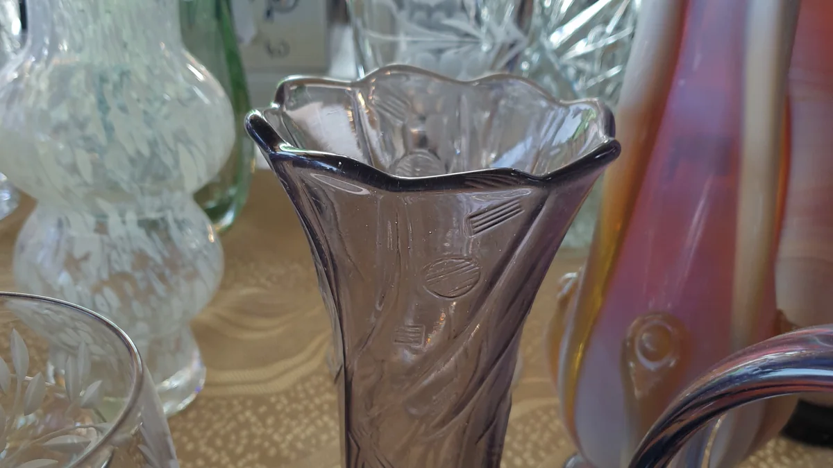 Outdoor flea market tables with vintage goods and bargain finds